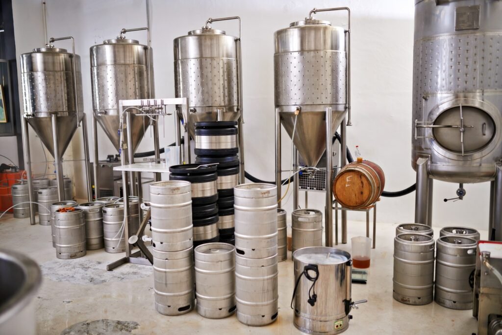 1000 liters of brewed goodness. Shot of steel tanks in a brewery.